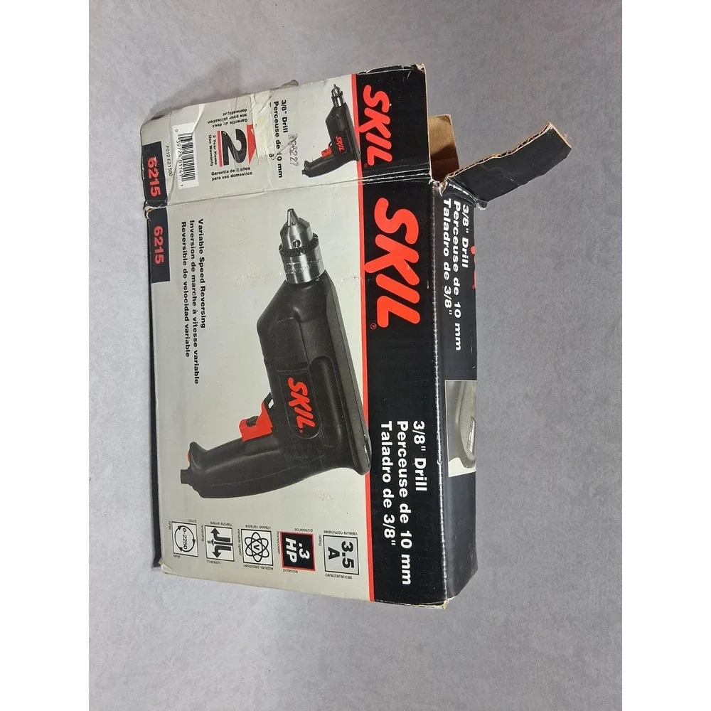 SKIL 6215 3/8 Variable Speed Reversing Drill. Chuck Key, Box And Book Included